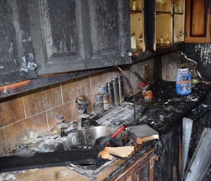 interior fire soot and smoke damage to kitchen cabinets